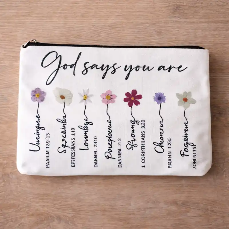 Pochette God Says You Are con fiori e Zip | Beauty Case con Messaggio Cristiano parole ispirazionali, fiori colorati e riferimenti biblici - immagine 2